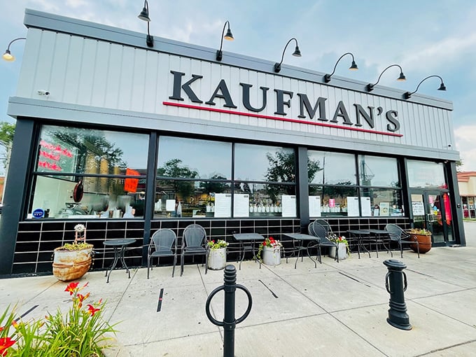 Welcome to sandwich paradise! Kaufman's exterior promises a feast for the senses, with its classic deli charm and inviting storefront. It's like the Willy Wonka factory, but for corned beef enthusiasts.