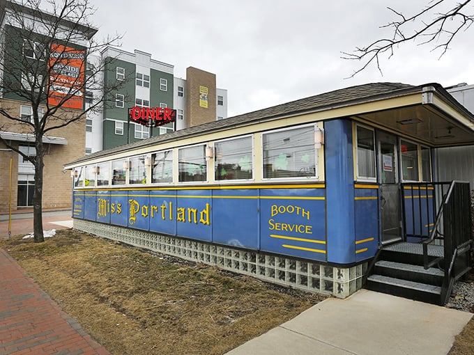 All aboard the flavor express! Miss Portland Diner's vibrant blue exterior promises a journey through time and taste buds.