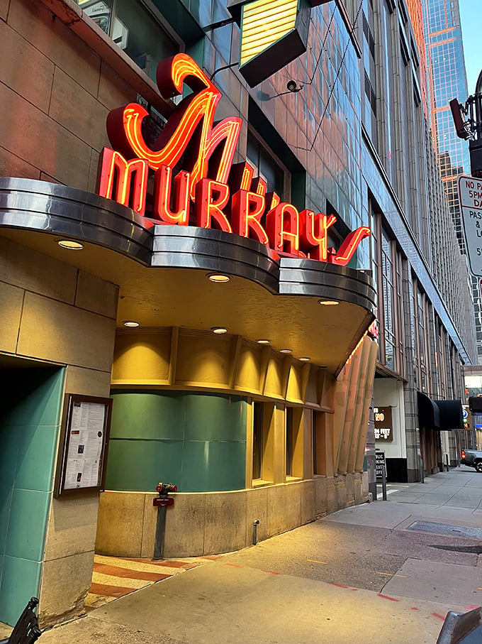 Neon dreams come true! Murray's iconic sign beckons like a lighthouse for the hungry, guiding you to a steakhouse oasis in downtown Minneapolis.