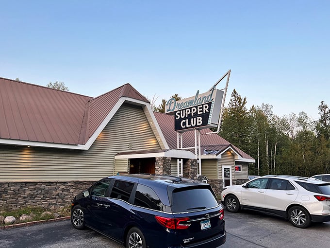 Neon dreams come true! Dreamland Supper Club's vintage sign beckons like a lighthouse for the hungry, promising a voyage through Wisconsin's culinary past.