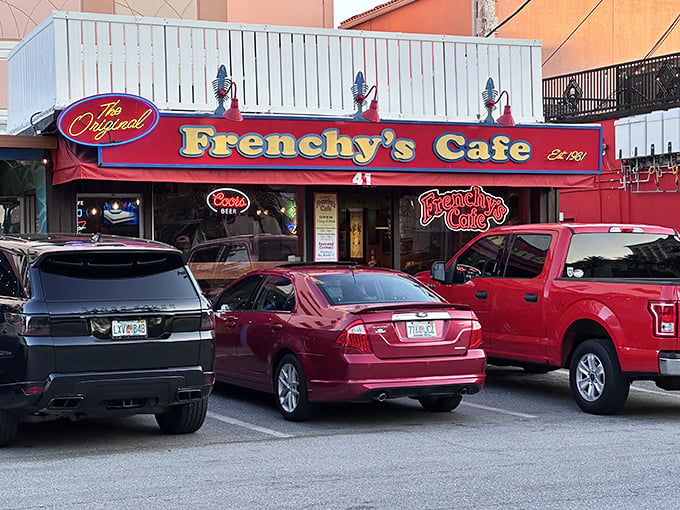 Welcome to flavor town! Frenchy's vibrant exterior, complete with a giant fish mural, promises a seafood adventure that'll make your taste buds do the cha-cha.