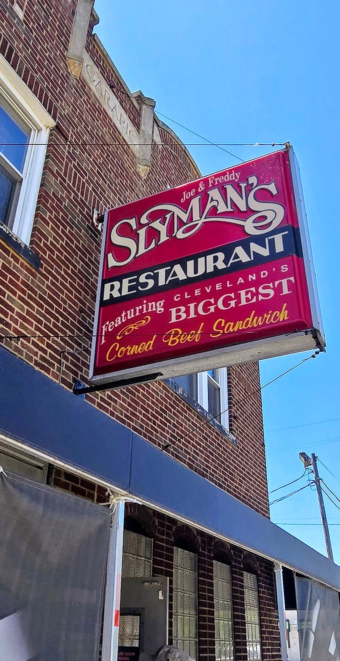 Welcome to potato pancake paradise! Slyman's iconic red sign beckons like a meaty lighthouse, guiding hungry souls to potato pancake nirvana.