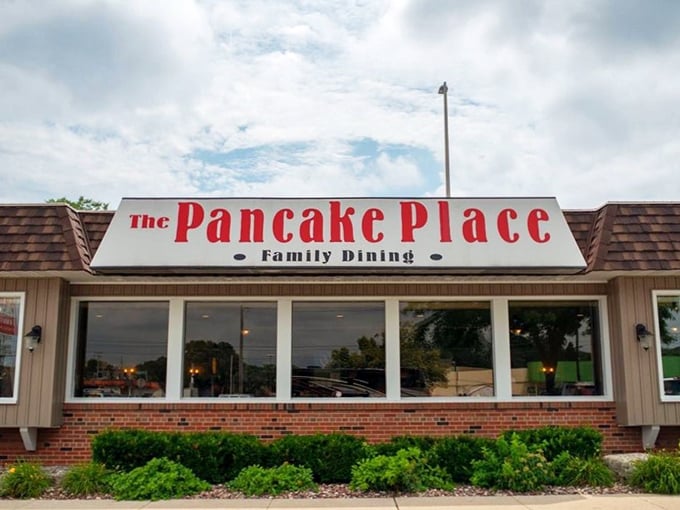 Where stacks of happiness are served daily: The Pancake Place, a family dining haven under cloudy Wisconsin skies.