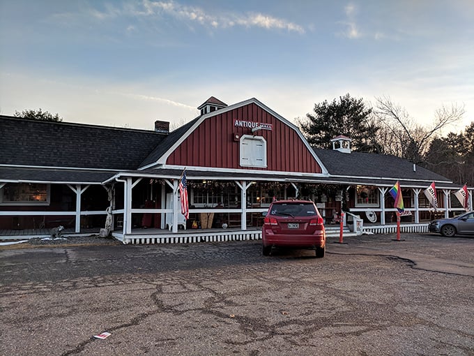 A barn-red beacon of nostalgia! This antique mall looks like it's been plucked straight from a Norman Rockwell painting, complete with a welcoming porch and patriotic flair.