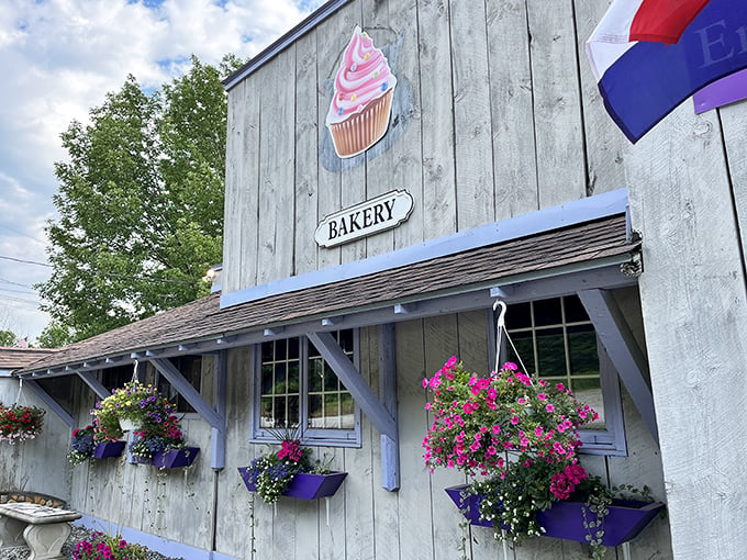 A cupcake sign that could double as a homing beacon for sweet-toothed adventurers. This charming exterior promises a sugar rush wrapped in small-town charm.