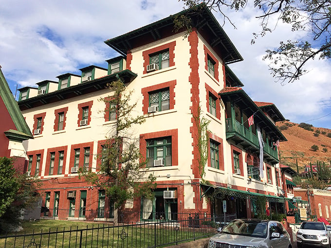 A grand dame of the Old West, the Copper Queen Hotel stands tall, her red-brick accents as bold as a cowboy's swagger.