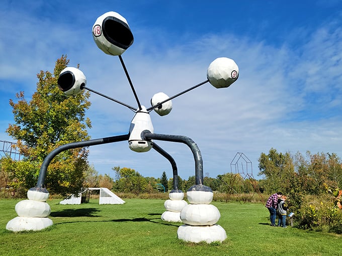 "Is it a bird? Is it a plane? No, it's a… car on stilts?" This towering sculpture proves that even automobiles can reach new heights in the world of art.