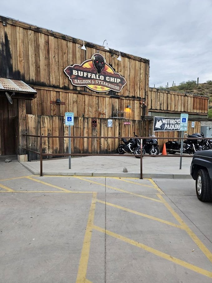 Howdy, partner! This ain't no Hollywood set – it's the real-deal Buffalo Chip Saloon, where the Old West lives on in all its wooden glory.