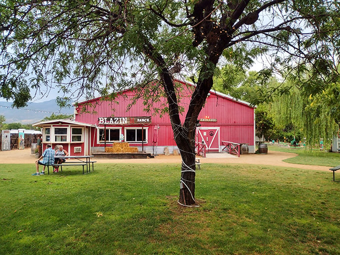 Welcome to the Wild West, pardner! This big red barn isn't just for horses – it's your gateway to cowboy adventures.