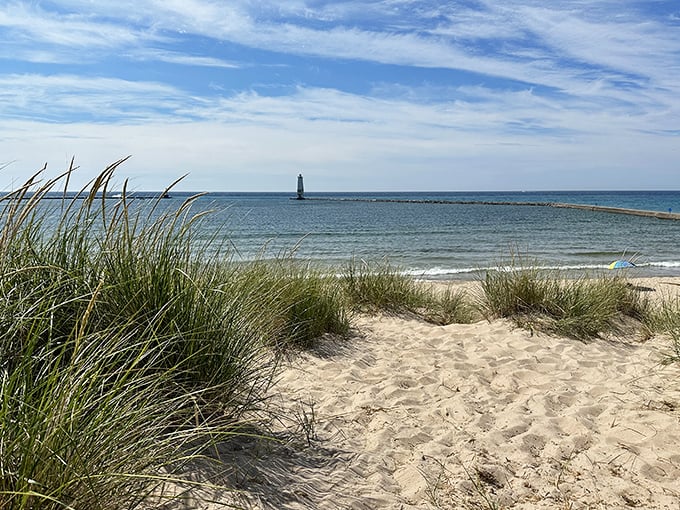 Frankfort Beach: Where the lighthouse stands guard and the waves whisper secrets. It's like a postcard come to life!