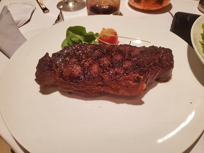 Holy cow! This ribeye's so perfectly seared, it could make a vegetarian question their life choices. Carnivore heaven, right here.