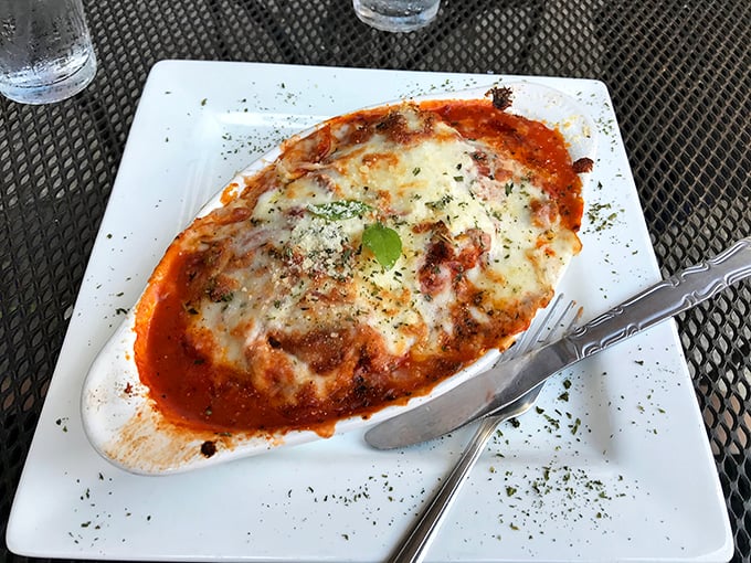 Eggplant Parmigiana: Layers of flavor that'll make you forget about lasagna's existence. It's a cheesy, saucy masterpiece that could unite veggie-lovers and carnivores alike. Photo credit: Eric Rasmussen