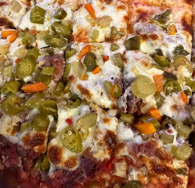 The Italian Beef Pizza: Where two Chicago favorites collide in a cheesy, meaty masterpiece. It's like the culinary equivalent of the Blues Brothers – a perfect duet.