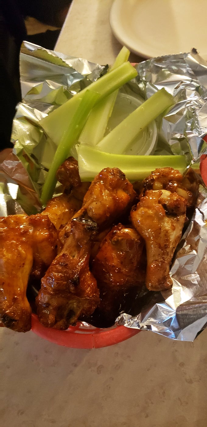 Wings that'll make you wish you had more fingers to lick. These saucy delights are so good, you might consider ordering them for dessert too.