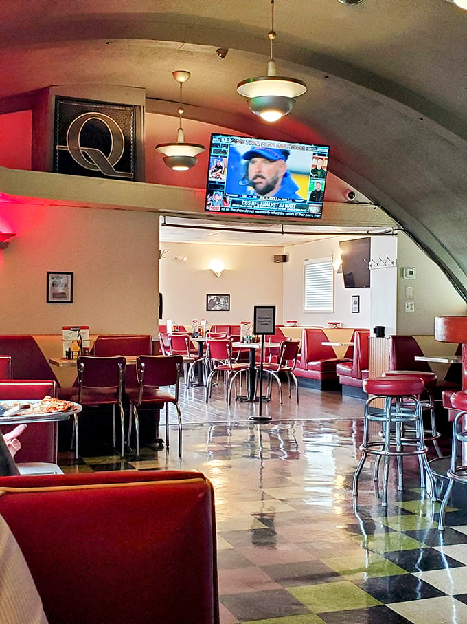 Cozy booths and retro charm make you feel right at home. It's like dining in your cool grandpa's basement, if your grandpa was a pizza wizard.