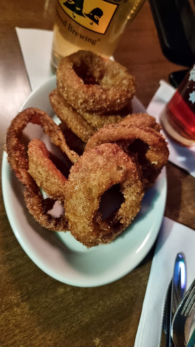Crispy, golden hoops of joy! These onion rings are like edible halos, sent straight from comfort food heaven.