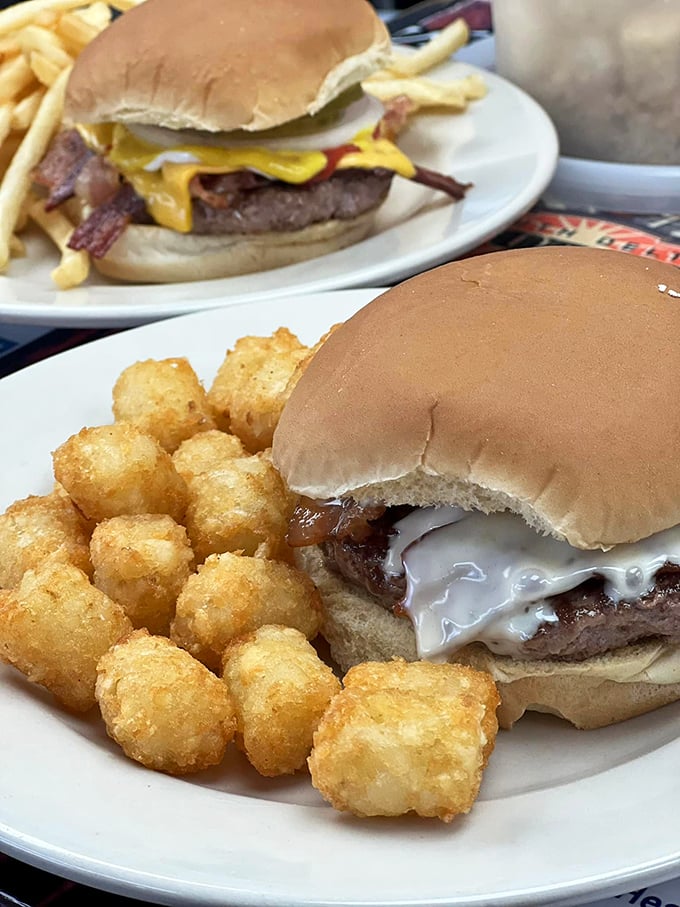 Burger bliss awaits! These beefy beauties are stacked higher than your grandpa's tales of walking to school uphill both ways.