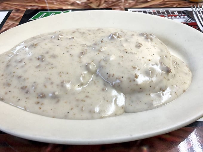 Biscuits and gravy: The South's gift to mankind. This creamy, peppery blanket of goodness could make a grown man weep.