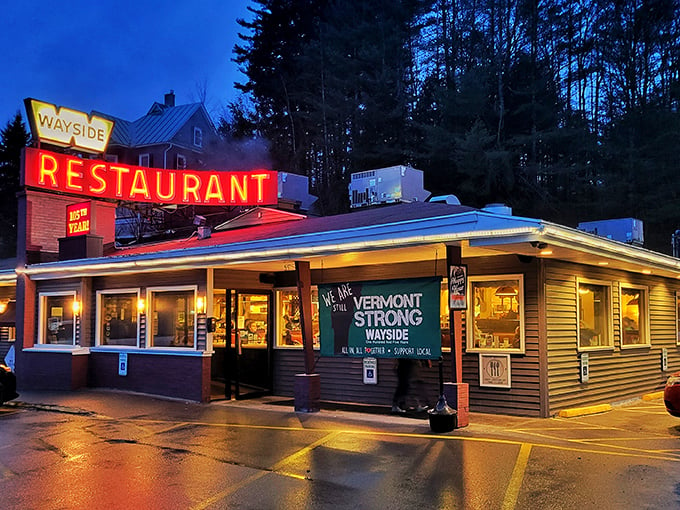 Neon dreams and comfort food schemes! Wayside's sign beckons like a lighthouse for the hungry traveler's soul.