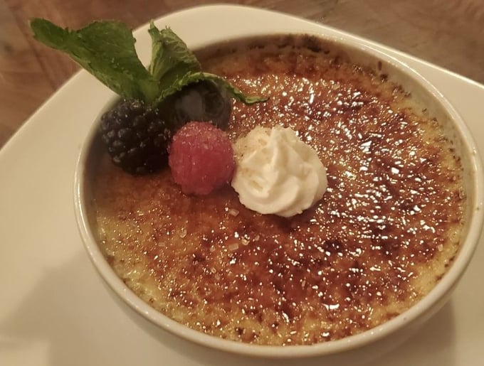 Crème brûlée so good, you'll want to write it love letters. That caramelized top is begging to be cracked like Da Vinci's code! Photo credit: Leriza P.