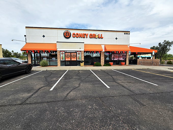 Detroit Coney Grill: A slice of Motor City in the desert! This cheery exterior is brighter than a retiree's new convertible.