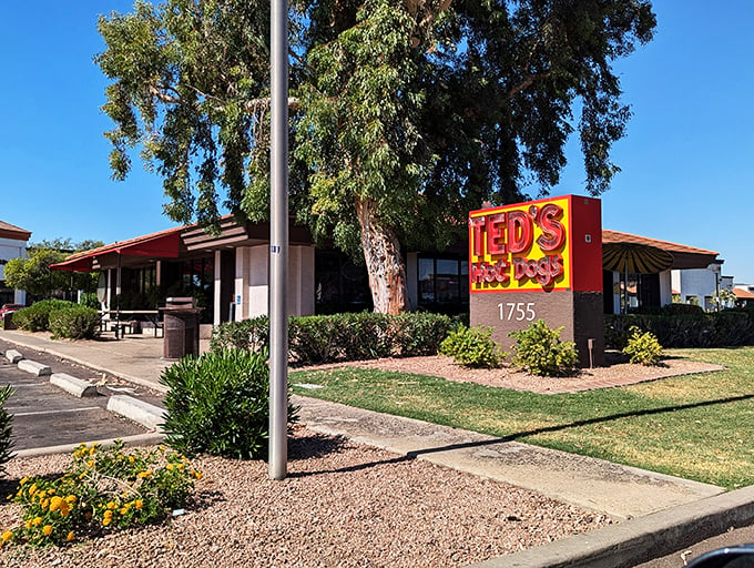 Ted's iconic red roof: A beacon of hope for hungry hot dog aficionados. It's like the North Star, but tastier.