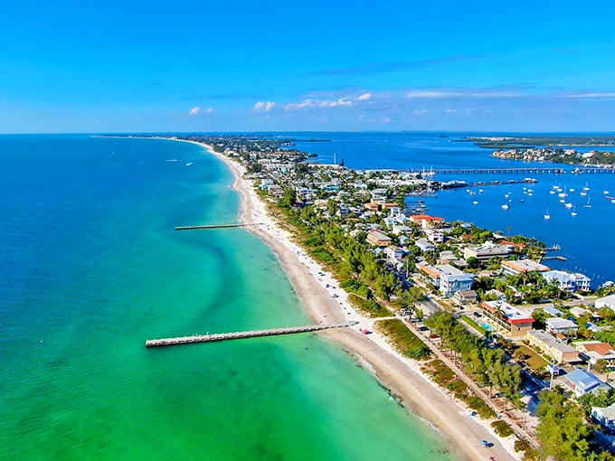 Anna Maria Island: Where "rush hour" means a flock of seagulls heading to dinner. This bird's-eye view reveals a perfect blend of nature and quaint island living.