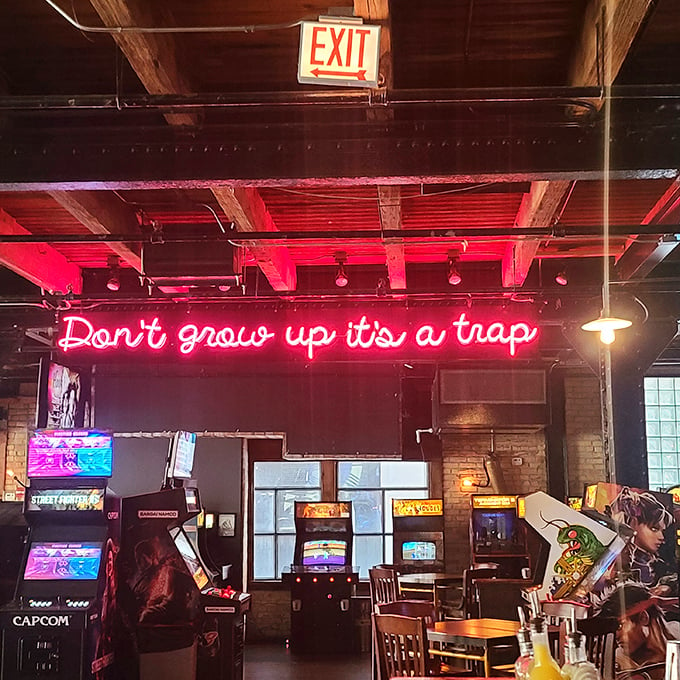 "Don't grow up, it's a trap," warns the neon wisdom. Headquarters Beercade: where your inner child and outer adult come to play – and drink!