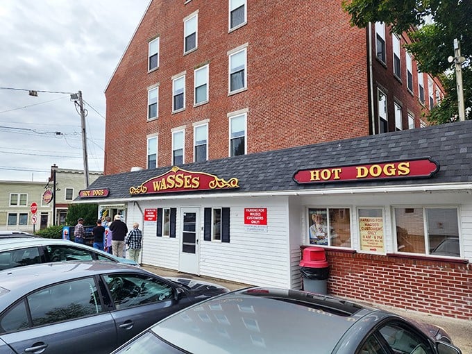 Wasses Hot Dogs: Where hot dog dreams come true! This unassuming facade hides a world of meaty magic waiting to be discovered.