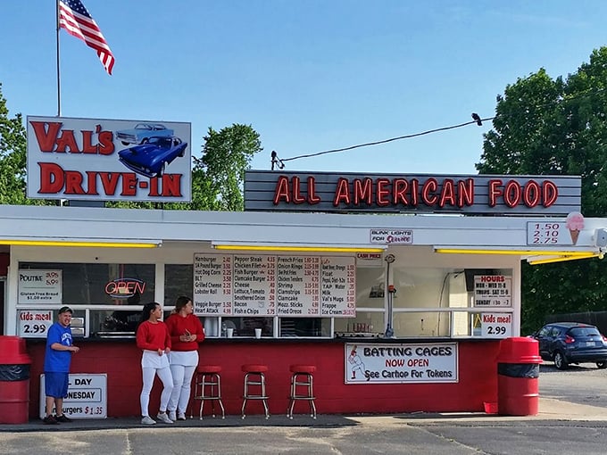 Val's Drive-In: Neon dreams and steamy screams! This classic drive-in serves up a slice of Americana with a side of nostalgia.