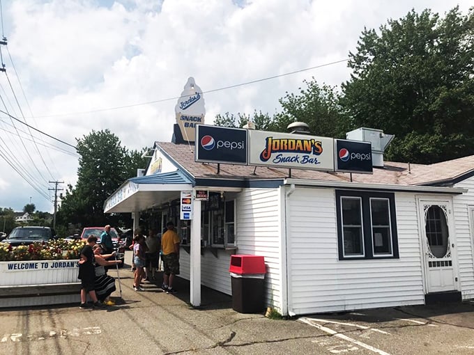 Jordan's Snack Bar: White picket fences of flavor! This cheery snack shack promises a hot dog experience that's pure summer bliss.