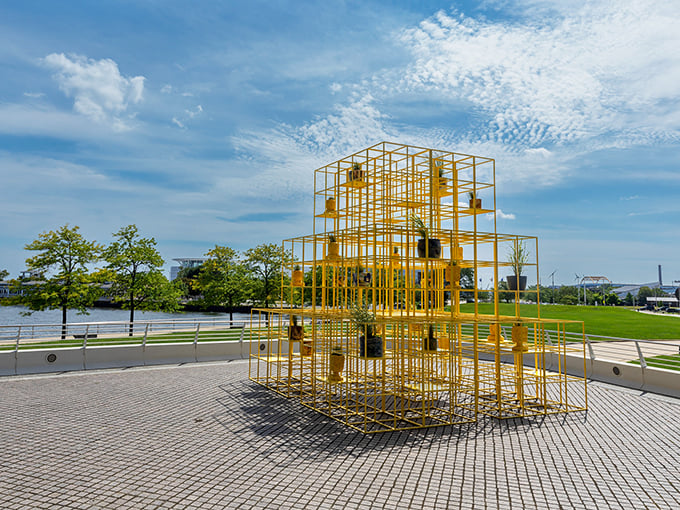 From giant yellow birds to chrome trees, this outdoor gallery turns sidewalks into runways.