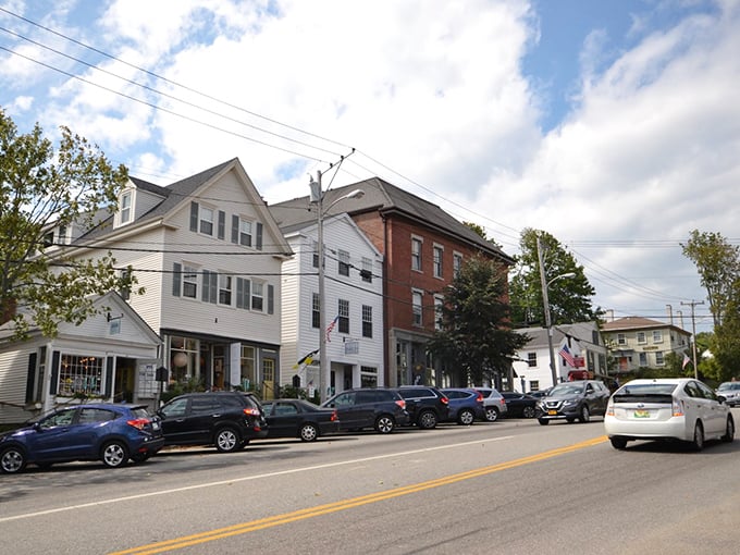 Small town, big personality! Quaint shops line the street, creating a scene straight out of a New England daydream.