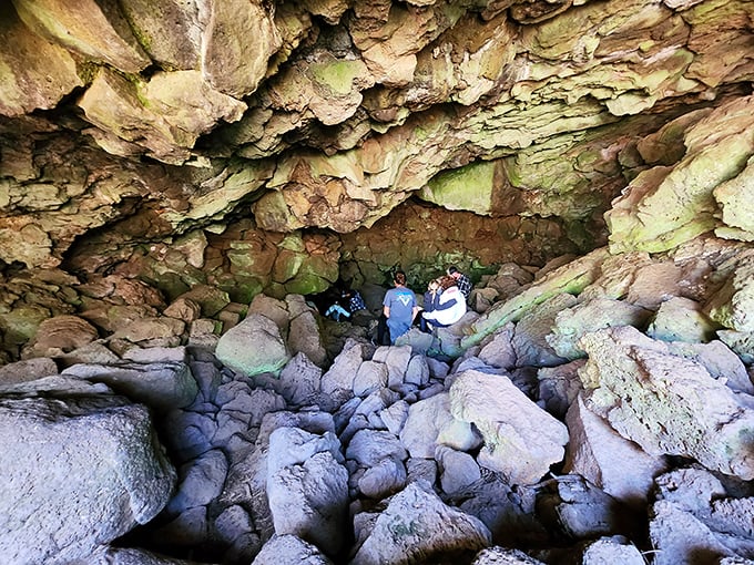 Down the rabbit hole we go! Alice had Wonderland, but these adventurers have a lava tube that's equally mind-bending and far less prone to random tea parties.