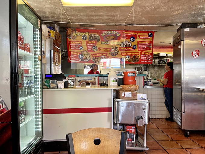 The unsung heroes of Micky's, working their magic behind the counter. They're like culinary wizards, but with better hats.