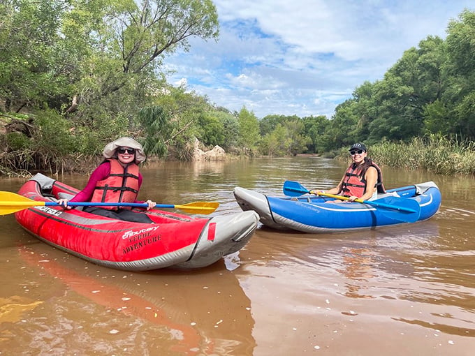 Paddle and pour! These kayakers are embarking on a different kind of wine cruise, trading ocean liners for the gentle currents of the Verde River.