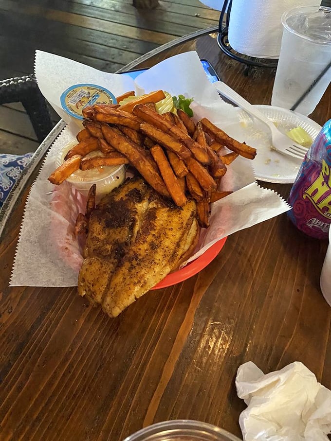 Holy grouper, Batman! This sandwich isn't just a meal, it's a Florida institution. Crispy, flaky, and ready for its close-up.