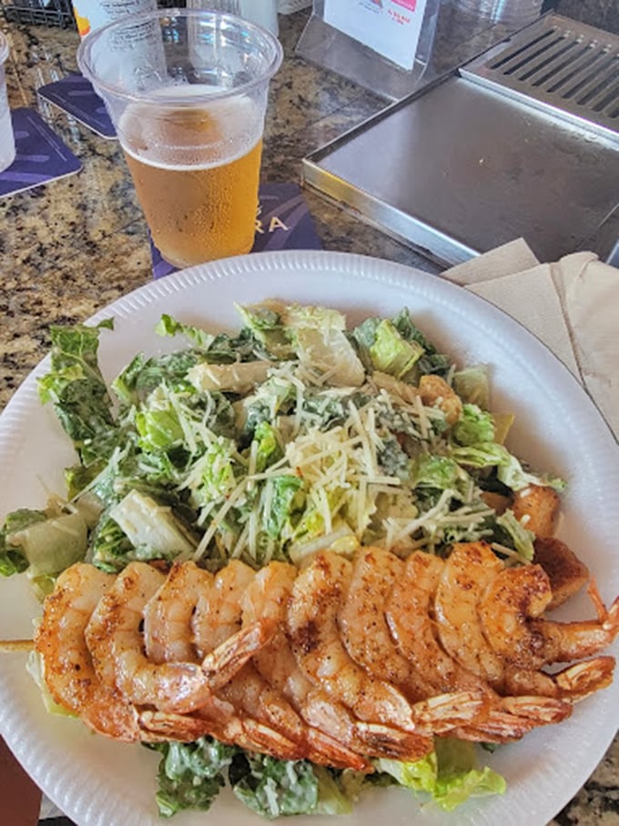 Shrimp on a salad? It's not just lunch, it's a refreshing ocean breeze on a plate. Dive in, seafood lovers!