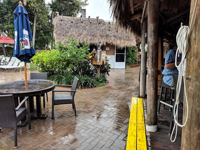 Rain or shine, Harold's outdoor seating is always fine. A little drizzle can't dampen these tropical vibes!