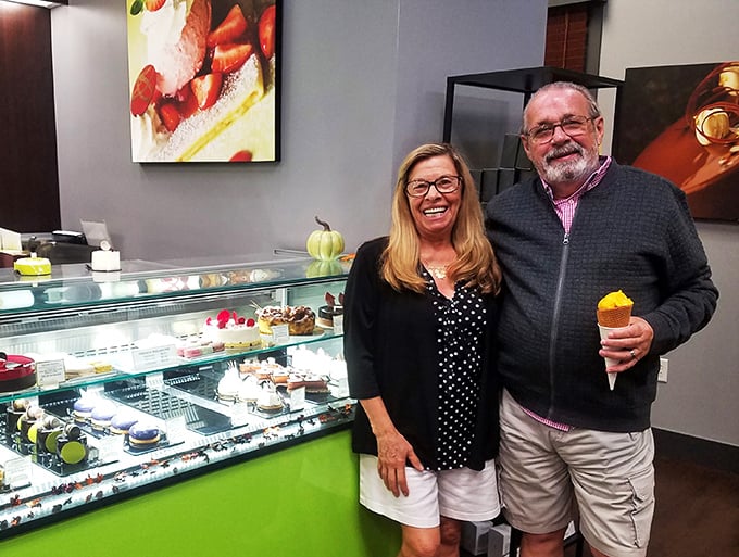 Happy customers are the best advertisement! These folks look like they've found their sweet spot at Norman Love's. Can you blame them?