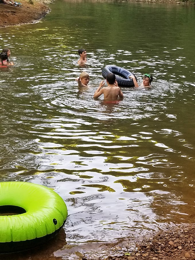 Splash mountain, Bell Smith style! These kids have discovered nature's own water park, no lines or tickets required.