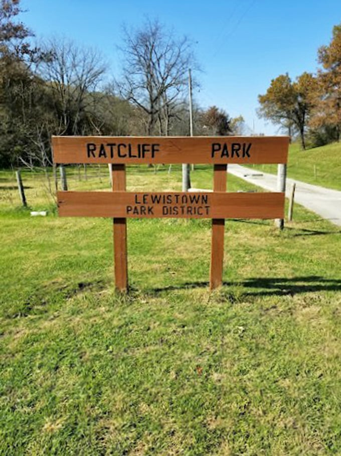 Welcome to Ratcliff Park, where the grass is always greener and the sign is always... well, exactly what you'd expect. No frills, just pure small-town charm!