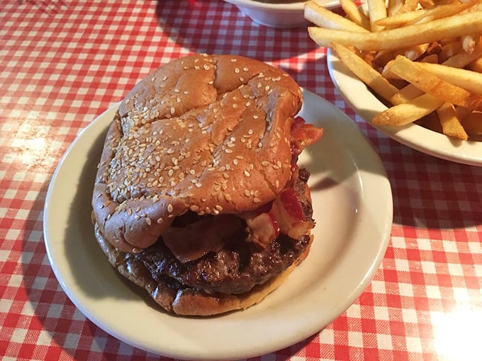 Behold, the bacon burger in all its glory! This isn't just a sandwich; it's a tower of temptation that would make even the Leaning Tower of Pisa jealous.