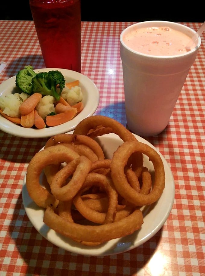 Ring-a-ding-ding! These golden hoops of happiness aren't just onion rings; they're crispy, battered halos of flavor. Resistance is futile!