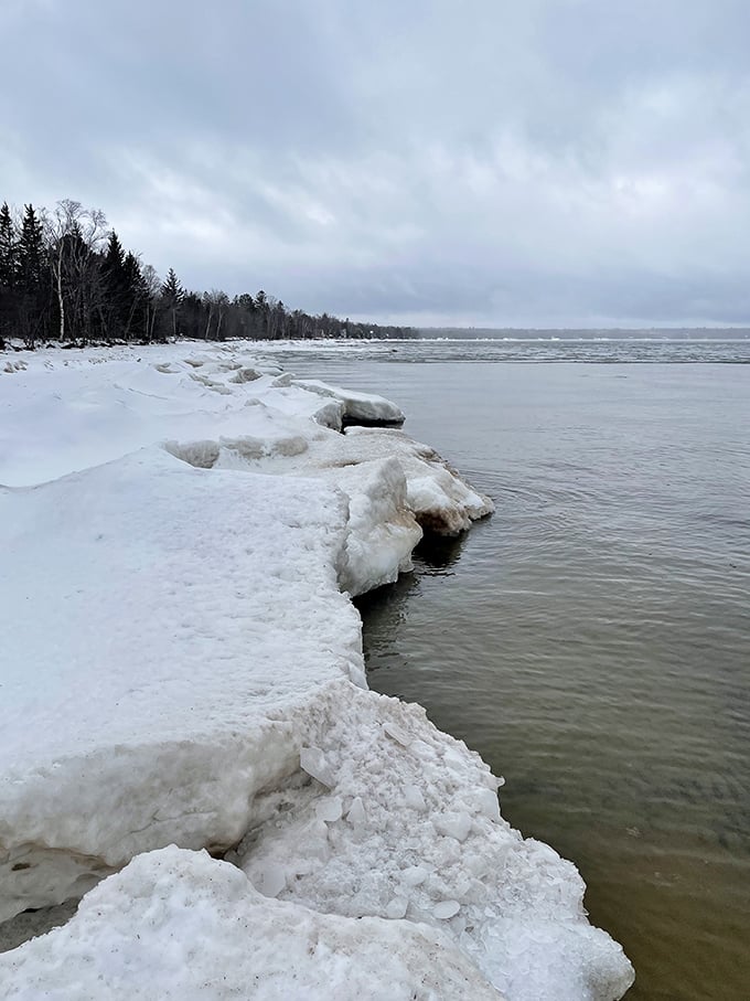 Winter's icy grip meets Superior's might. It's like nature's own epic arm-wrestling match, and we're all spectators.