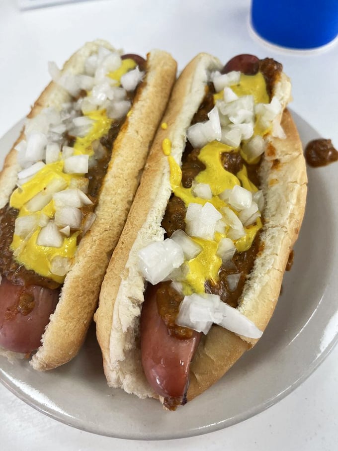 Behold, the Coney dog in all its glory! These beauties are dressed to impress with more toppings than a sundae bar.