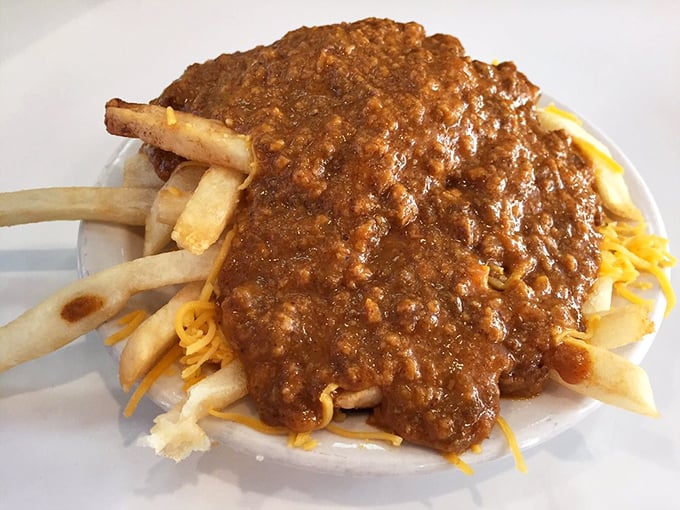 Chili cheese fries: The ultimate guilty pleasure. It's like your taste buds won the lottery, but your arteries lost the bet.