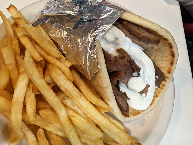 Gyro: The Greek god of sandwiches! This bad boy is packed tighter than a subway car at rush hour.