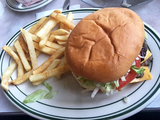 This isn't just a burger, it's a tower of taste. With a bun that could double as a pillow, it's the stuff food dreams are made of.