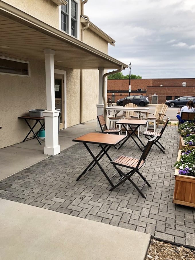 Al fresco reading, anyone? This outdoor space is perfect for soaking up sunshine and stories. It's like your backyard patio got a literary makeover.